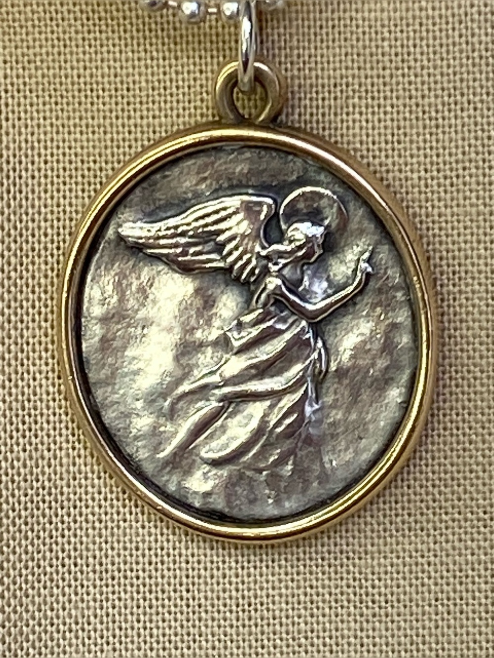 Retired James Avery Sterling and Bronze Seraphina Pendant.
